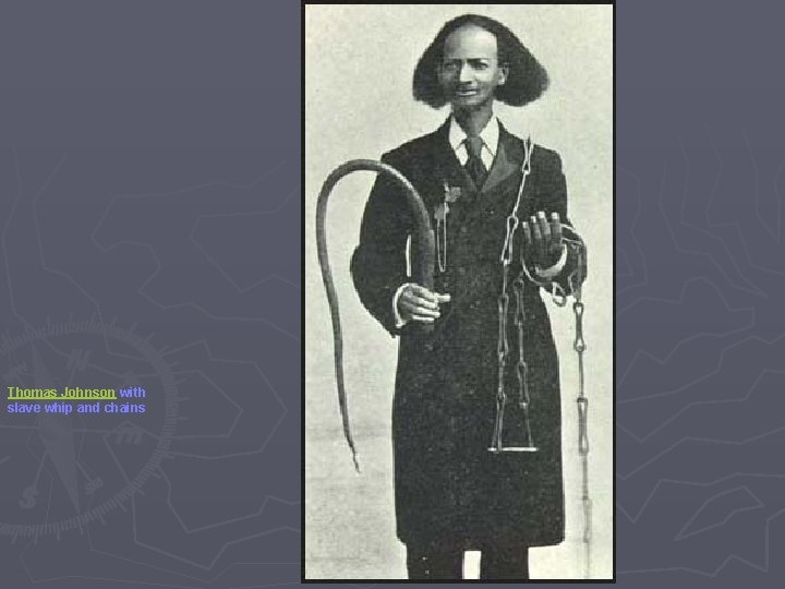 Thomas Johnson with slave whip and chains 