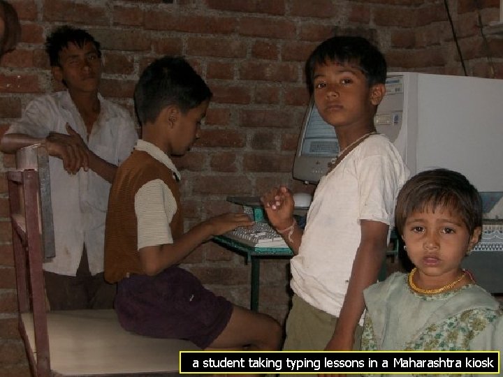 a student taking typing lessons in a Maharashtra kiosk 