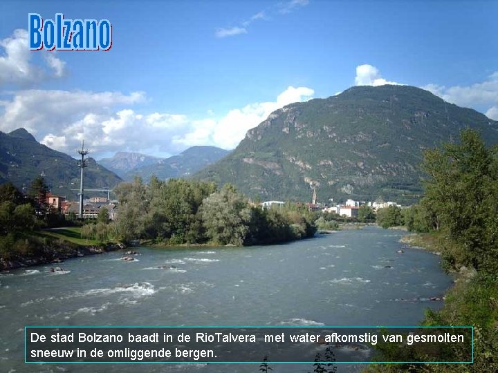 De stad Bolzano baadt in de Rio. Talvera met water afkomstig van gesmolten sneeuw