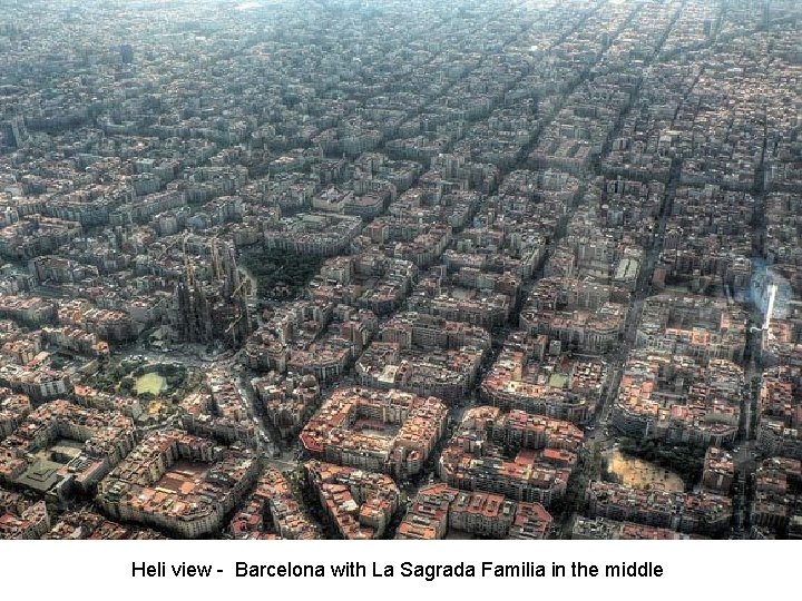 Heli view - Barcelona with La Sagrada Familia in the middle 