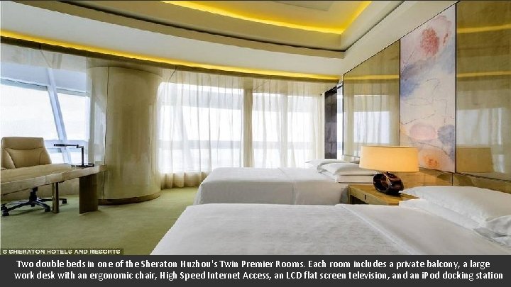 Two double beds in one of the Sheraton Huzhou's Twin Premier Rooms. Each room
