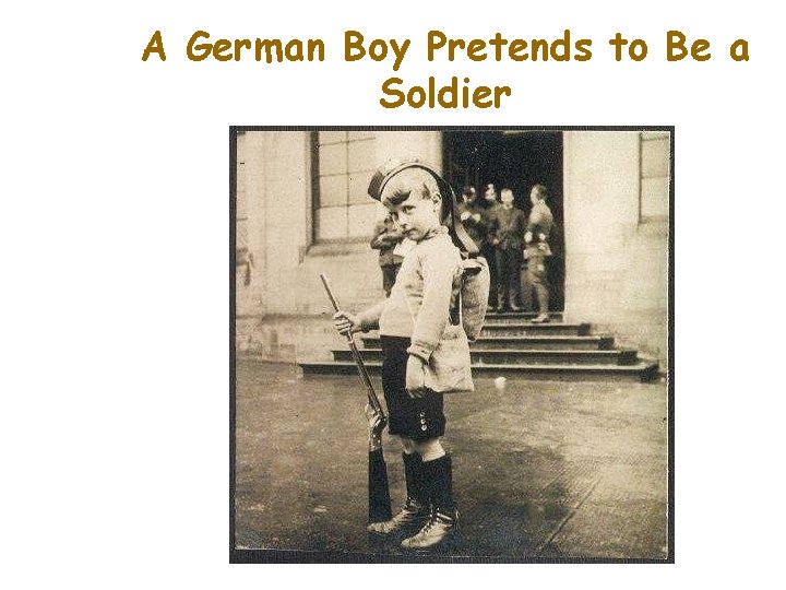 A German Boy Pretends to Be a Soldier 