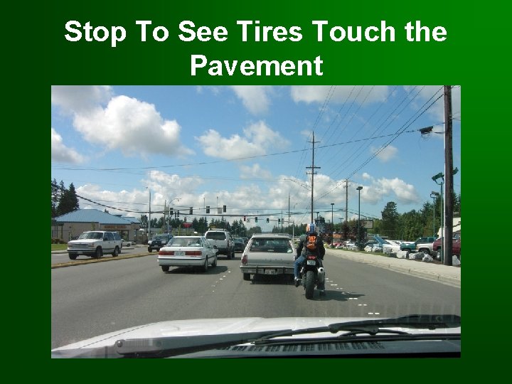 Stop To See Tires Touch the Pavement 