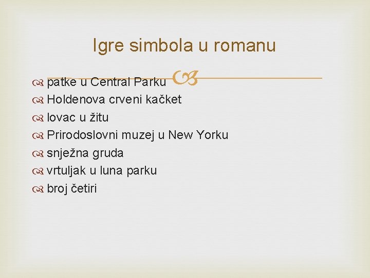 Igre simbola u romanu patke u Central Parku Holdenova crveni kačket lovac u žitu Igre simbola u romanu patke u Central Parku Holdenova crveni kačket lovac u žitu
