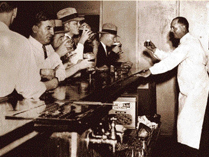 Al Capone Detroit police inspecting equipment found in a hidden underground brewery during Chicago