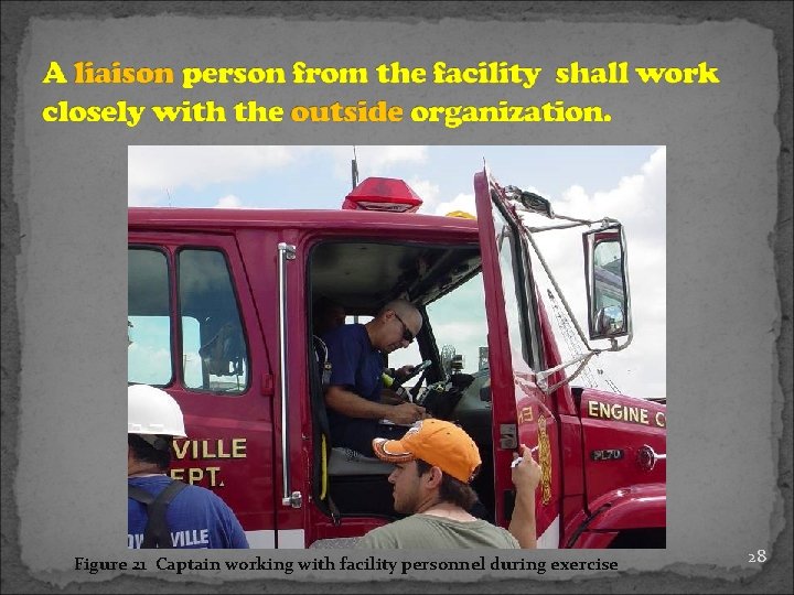 Figure 21 Captain working with facility personnel during exercise 28 