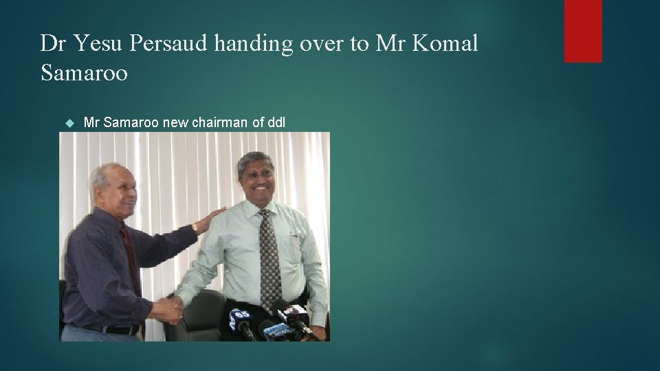 Dr Yesu Persaud handing over to Mr Komal Samaroo Mr Samaroo new chairman of