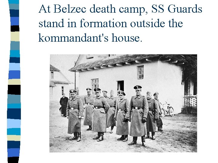 At Belzec death camp, SS Guards stand in formation outside the kommandant's house. 