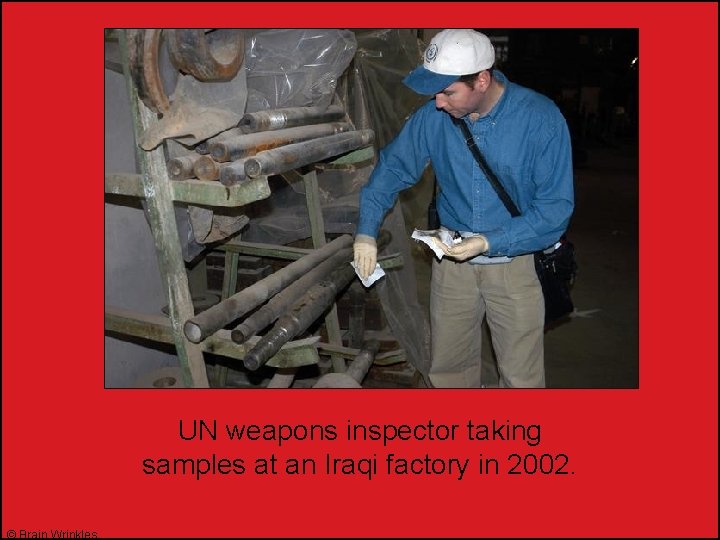 UN weapons inspector taking samples at an Iraqi factory in 2002. © Brain Wrinkles