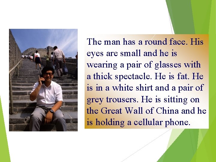 The man has a round face. His eyes are small and he is wearing