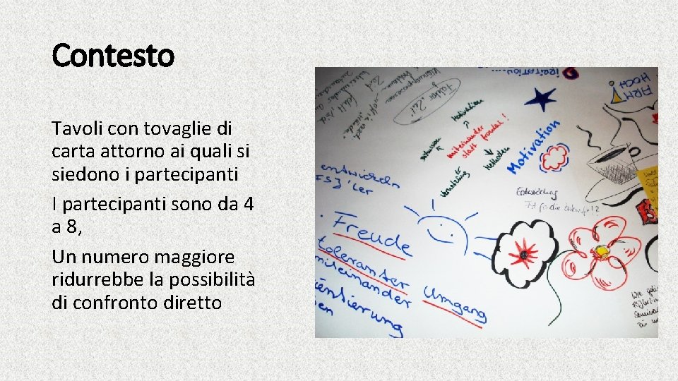 Contesto Tavoli con tovaglie di carta attorno ai quali si siedono i partecipanti I