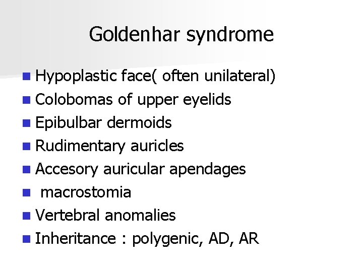 Goldenhar syndrome n Hypoplastic face( often unilateral) n Colobomas of upper eyelids n Epibulbar