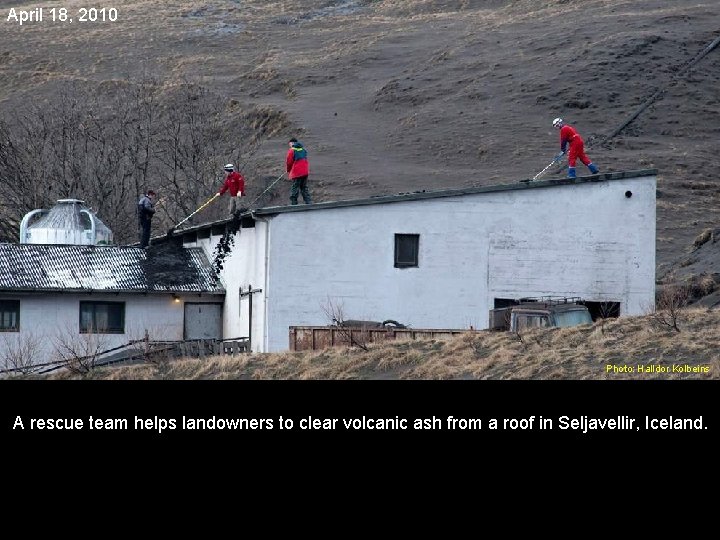 April 18, 2010 Photo: Halldor Kolbeins A rescue team helps landowners to clear volcanic