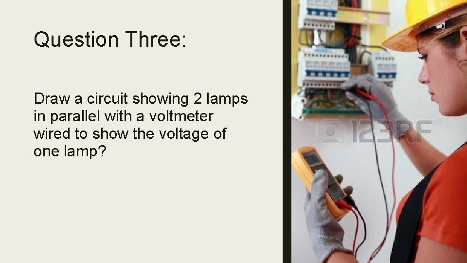 Question Three: Draw a circuit showing 2 lamps in parallel with a voltmeter wired