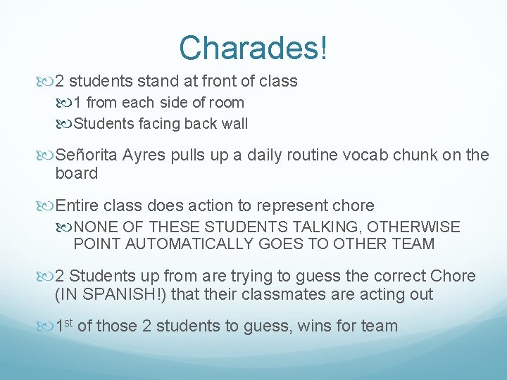 Charades! 2 students stand at front of class 1 from each side of room