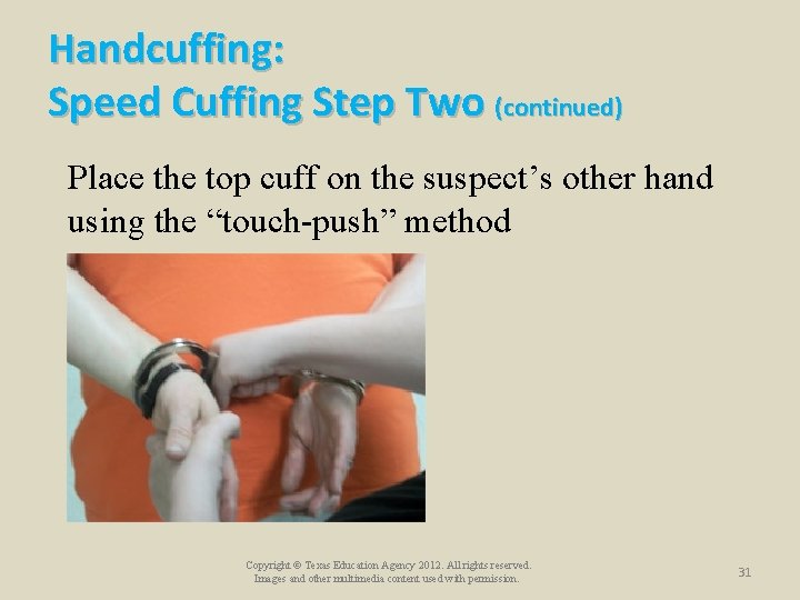 Handcuffing: Speed Cuffing Step Two (continued) Place the top cuff on the suspect’s other Handcuffing: Speed Cuffing Step Two (continued) Place the top cuff on the suspect’s other