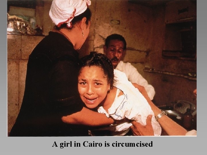 A girl in Cairo is circumcised 