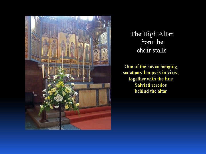 The High Altar from the choir stalls One of the seven hanging sanctuary lamps