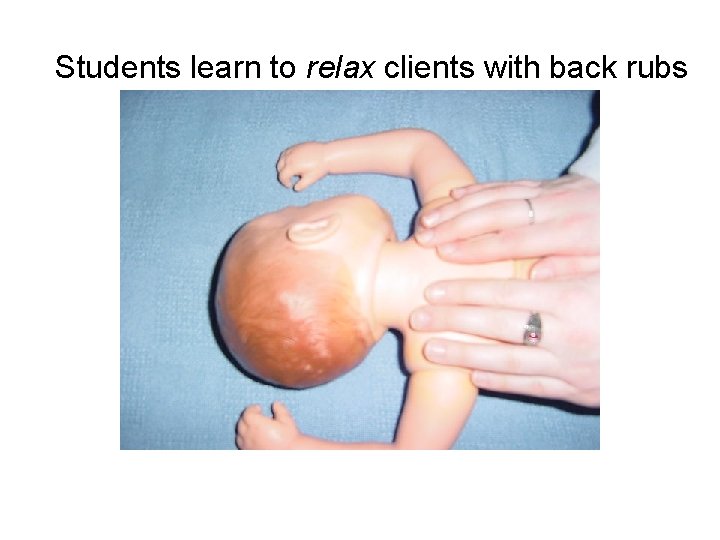 Students learn to relax clients with back rubs 