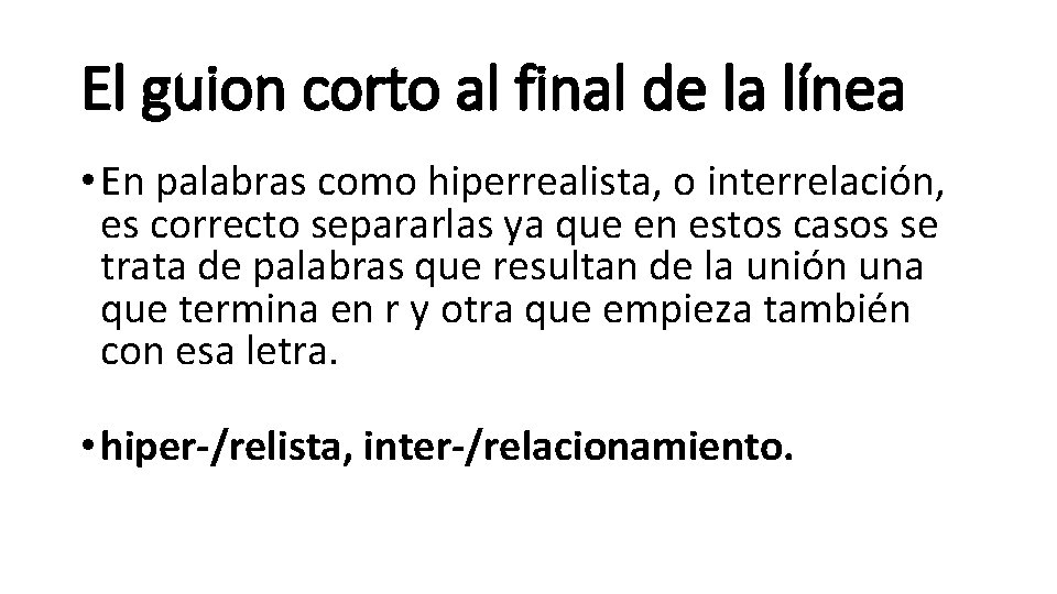 El guion corto al final de la línea • En palabras como hiperrealista, o