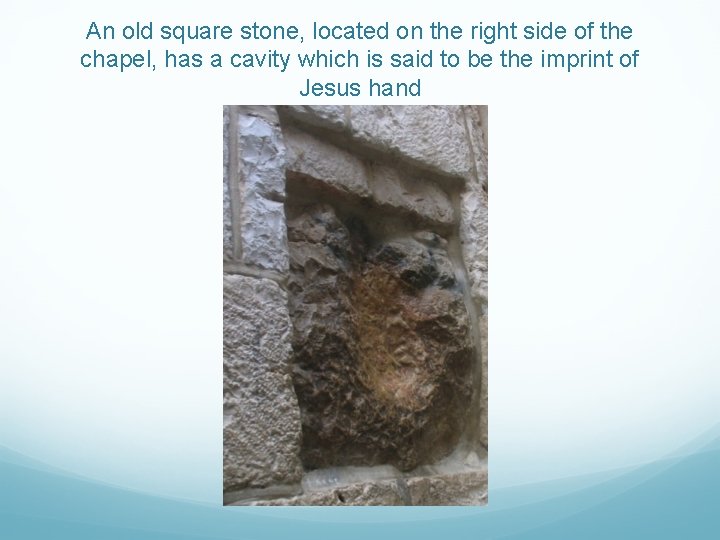 An old square stone, located on the right side of the chapel, has a