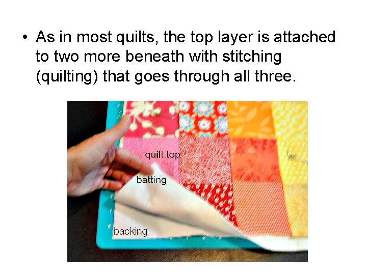  • As in most quilts, the top layer is attached to two more