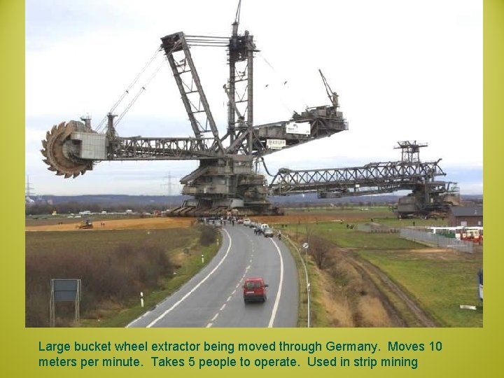 Large bucket wheel extractor being moved through Germany. Moves 10 meters per minute. Takes