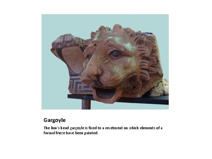 Gargoyle The lion's head gargoyle is fixed to a revetment on which elements of