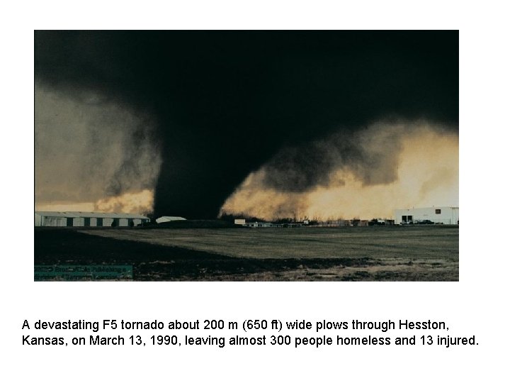 A devastating F 5 tornado about 200 m (650 ft) wide plows through Hesston, A devastating F 5 tornado about 200 m (650 ft) wide plows through Hesston,