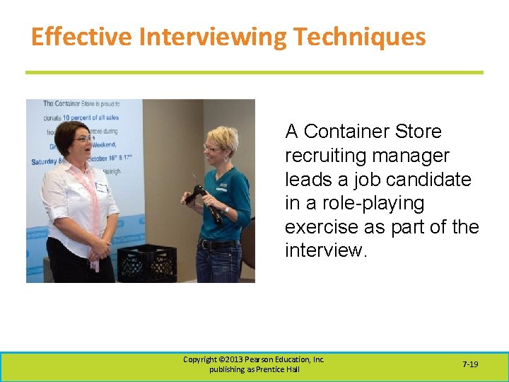 Effective Interviewing Techniques A Container Store recruiting manager leads a job candidate in a