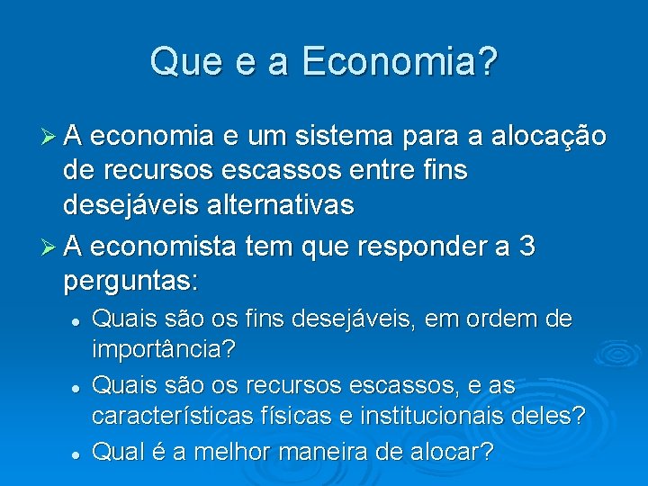 Que e a Economia? Ø A economia e um sistema para a alocação de