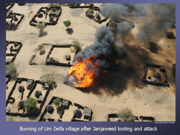Courtesy Brian Steidle Burning of Um Zeifa village after Janjaweed looting and attack 