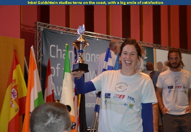 Inbal Goldshtein studies terns on the coast, with a big smile of satisfaction 