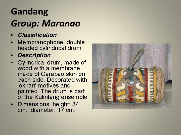 Gandang Group: Maranao • Classification • Membranophone, double headed cylindrical drum • Description •