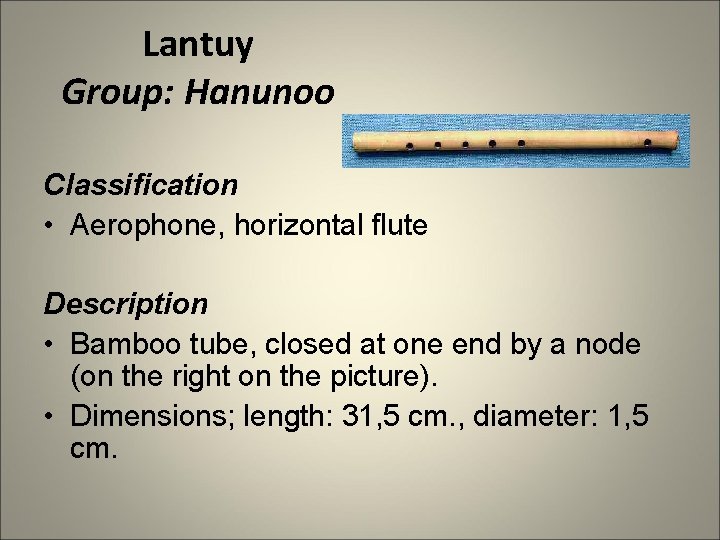 Lantuy Group: Hanunoo Classification • Aerophone, horizontal flute Description • Bamboo tube, closed at