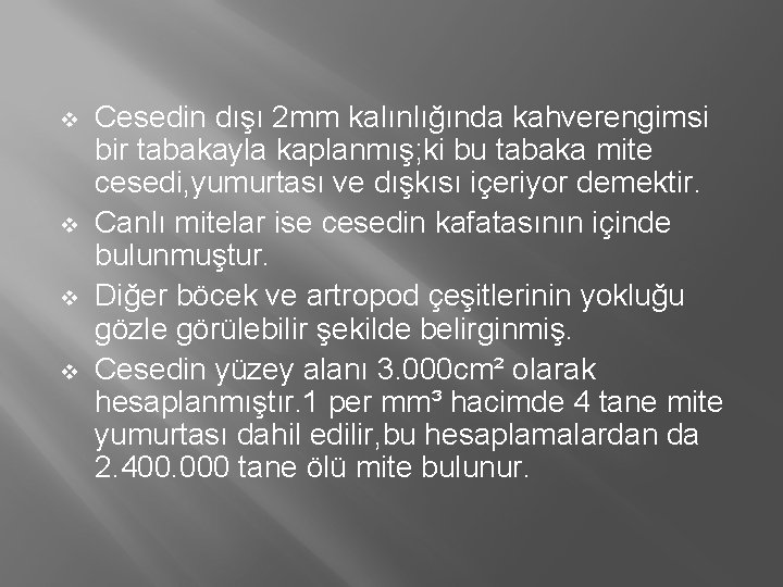 v v Cesedin dışı 2 mm kalınlığında kahverengimsi bir tabakayla kaplanmış; ki bu tabaka v v Cesedin dışı 2 mm kalınlığında kahverengimsi bir tabakayla kaplanmış; ki bu tabaka