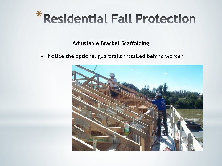 * Adjustable Bracket Scaffolding • Notice the optional guardrails installed behind worker * Adjustable Bracket Scaffolding • Notice the optional guardrails installed behind worker