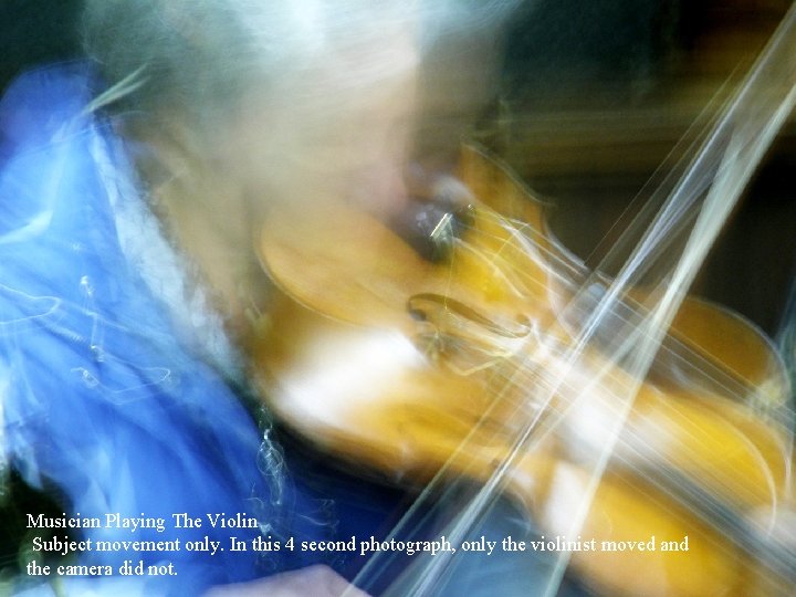 Musician Playing The Violin Subject movement only. In this 4 second photograph, only the