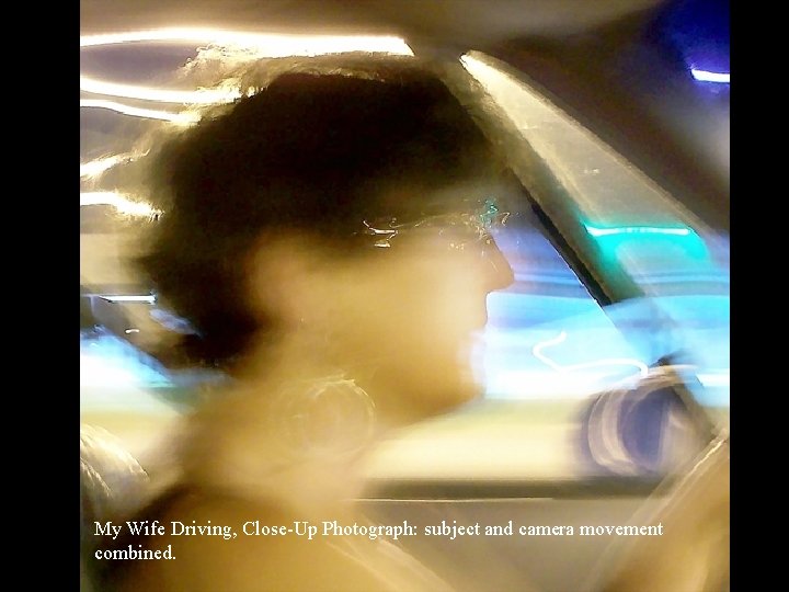 My Wife Driving, Close-Up Photograph: subject and camera movement combined. 