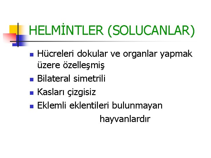 HELMİNTLER (SOLUCANLAR) n n Hücreleri dokular ve organlar yapmak üzere özelleşmiş Bilateral simetrili Kasları HELMİNTLER (SOLUCANLAR) n n Hücreleri dokular ve organlar yapmak üzere özelleşmiş Bilateral simetrili Kasları