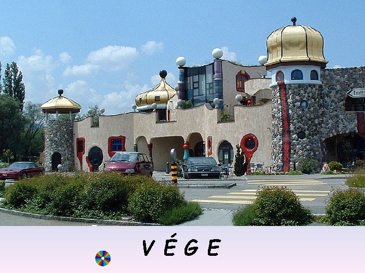 V É G E 