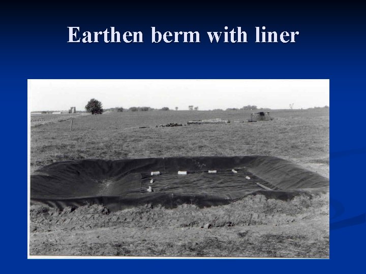 Earthen berm with liner 