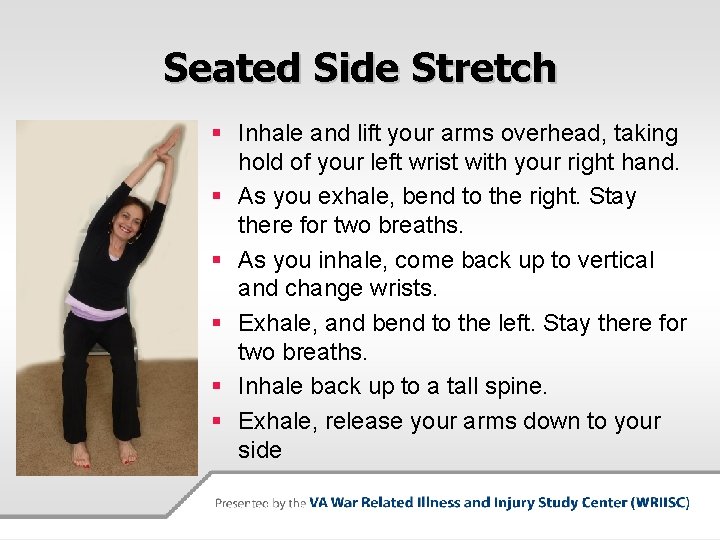 Seated Side Stretch § Inhale and lift your arms overhead, taking hold of your