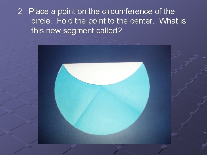 2. Place a point on the circumference of the circle. Fold the point to