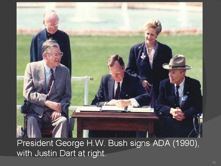 President George H. W. Bush signs ADA (1990), with Justin Dart at right. 10