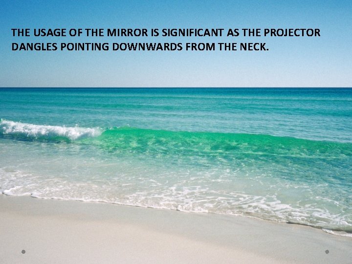 THE USAGE OF THE MIRROR IS SIGNIFICANT AS THE PROJECTOR DANGLES POINTING DOWNWARDS FROM THE USAGE OF THE MIRROR IS SIGNIFICANT AS THE PROJECTOR DANGLES POINTING DOWNWARDS FROM