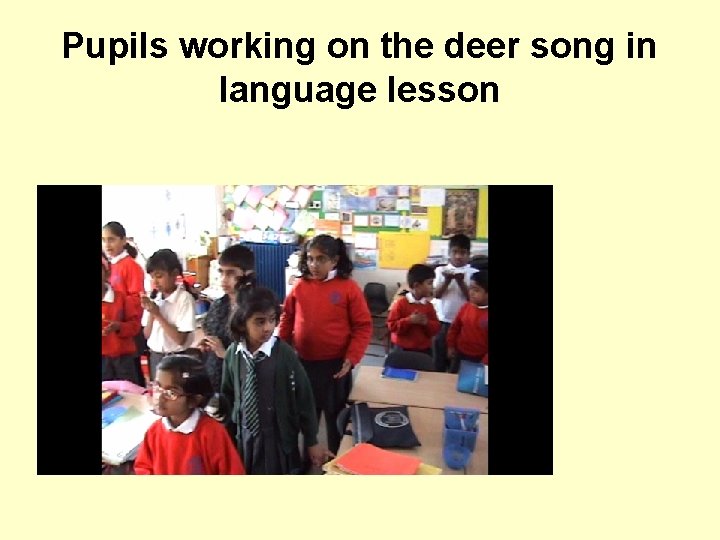 Pupils working on the deer song in language lesson 