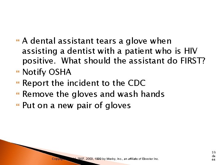  A dental assistant tears a glove when assisting a dentist with a patient