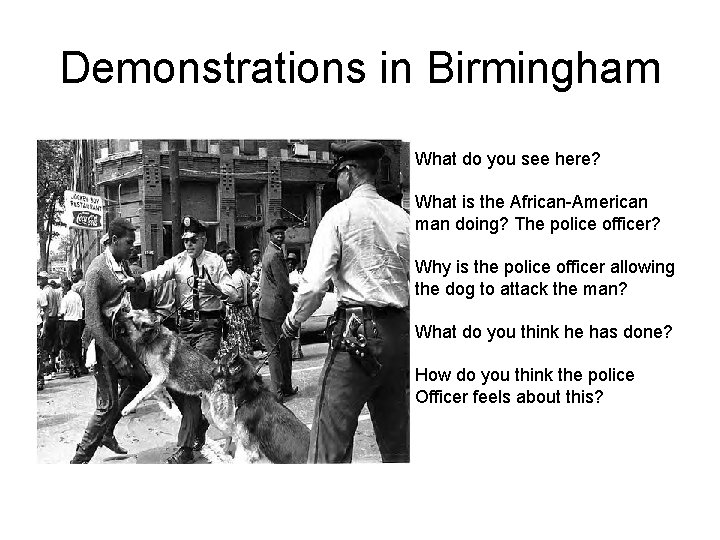 Demonstrations in Birmingham What do you see here? What is the African-American man doing?