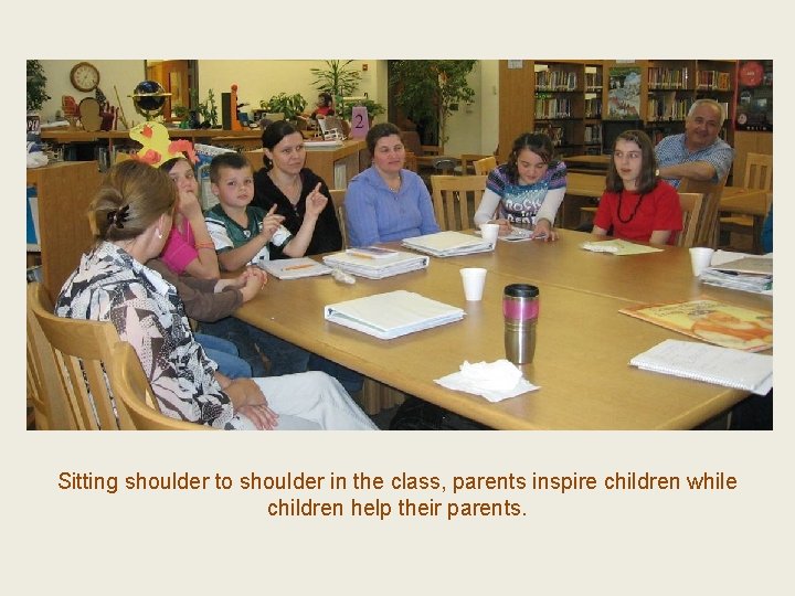 Sitting shoulder to shoulder in the class, parents inspire children while children help their